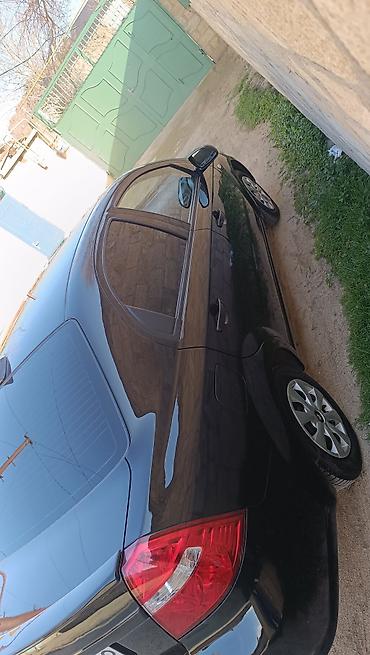 baic azerbaijan: Chevrolet Aveo sedan – qara rəng, Azərbaycan nömrə nişanı 99-CH-962 — 4