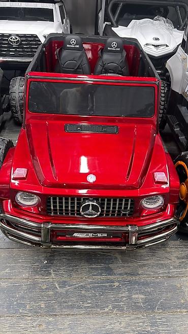 Детский электромобиль в стиле внедорожника Mercedes-AMG, красный