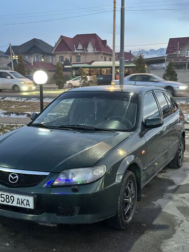 Mazda: Mazda 323: 2002 г., 1.3 л, Механика, Бензин, Хэтчбэк