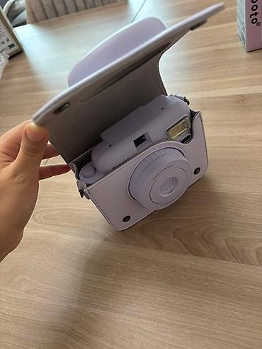 popo boyudən: Popoto ani çəkilən fotoaparat dəsti. Dəstə fotoaparatın özü, çexolu — 3
