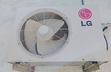 iphonr 11: LG split tip kondisioner – model TSU-H1865MA1 (xarici blok üzərindəki — 2