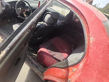 американский номер: Mazda 121: 1991 г., 1.3 л, Механика, Бензин, Седан — 7