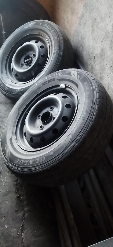 tir: Комплект из 2 колес в сборе: шины Dunlop Enasave EC202 215/70 R14 91S — 1