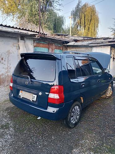 дом в колесах: Mazda Demio: 2000 г., 1.3 л, Механика, Бензин, Универсал — 1
