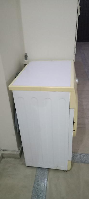hamam kranti: LG ön yükləməli paltaryuyan maşın - Tutum: 5 kq (paneldə qeyd olunub) — 3