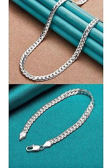 bleu de chanel qiyməti: Gümüşü rəngdə zəncir və qolbaq dəsti, yenidir. dəst qolbaq sep 16₼ — 7