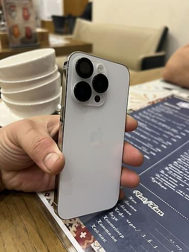Мобильные телефоны: IPhone 14 Pro (белый/серебристый) - Экран 6.1", OLED Super Retina — 5