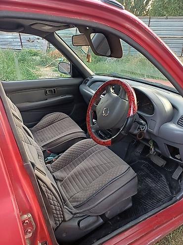 хетчбек: Nissan Micra: 1997 г., Бензин, Хэтчбэк — 5