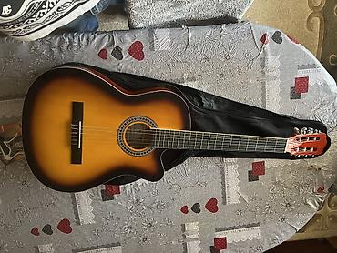 gitara capo: Salam Gitar əla vəziyətdədir istifadə olunmuyub hecbir problemi yoxdur — 1