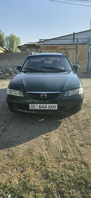 япония машина: Mazda Capella: 2000 г., 2 л, Механика, Бензин, Универсал — 3