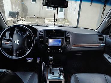Mitsubishi: Mitsubishi Pajero (GLS) SUV - Kuzov: qara rəng, 5 qapı, yan — 6