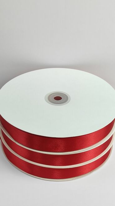 Декоративные ленты и банты: Атласные ленты красного цвета Ширина - 2 см Метраж - 100 м