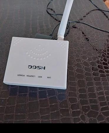 tp link modem satilir: TP-Link TL-WR844N 300Mbps Wi‑Fi router + HSGQ GPON/XPON ONU (optik — 1