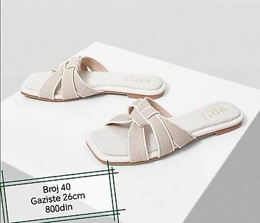ugg kucne papuce: Ženske papuče sa širokim kaiševima u bež boji. Kaiševi su ukršteni i — 1