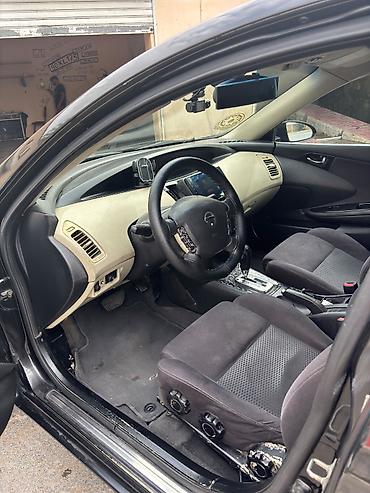 Транспорт: Nissan Primera: 2 л | 2005 г. Седан — 7