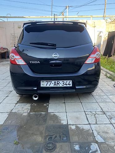 bmw e 39: Nissan Tiida, qara rəng, hetçbek gövdə. - Güclü və qənaətcil benzin — 1