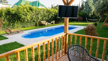 Uzunmüddətli kirayə evlər: Novxanıda gözəl həyəti, hovuzu, həyətdə besedkası olan ikimərtəbəli — 1