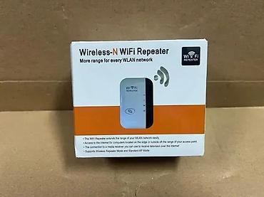 Modemi, ruteri i mrežni uređaji: Wireless‑N WiFi Repeater Opis: - Pojačivač/bežični repetitor koji — 6