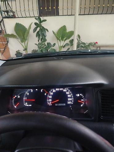 tra: Toyota Corolla hatchback (E120) – gümüş rəng. Texniki xüsusiyyətlər — 2