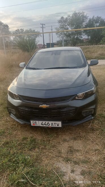 шины на одиссей: Седан Chevrolet Malibu темного цвета, оборудованный современной
