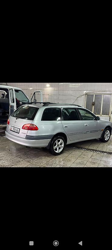 форд галакси: Toyota Avensis: 2001 г. — 4