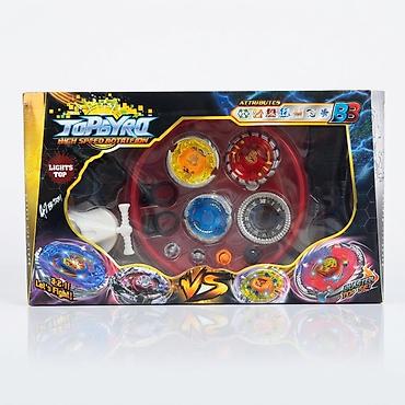 Игрушки: Игровой набор для сражений волчков 4шт TopGyro (High Speed Rotation) — 1
