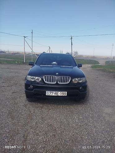 for x5 magic: BMW X5 (E53) – mat qara rəngli, şəhər və off-road üçün rahat SUV — 9