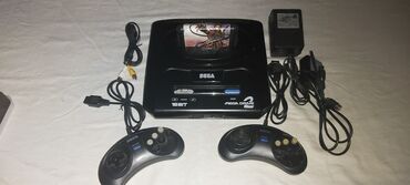 oyun komputer qiymetleri: Sega mega drive 2 original enli plata əla işləyir mortal kombat 3