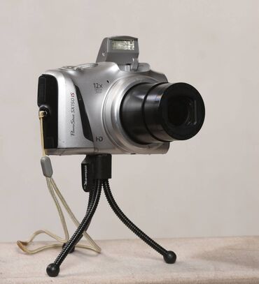 canon 3 в одном: Canon PowerShot SX150 is, 14 Мпикс, Оптический Zoom 12x, формат
