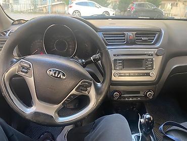 hongqi e qm5: Kia Rio: 2016 г., 1.6 л, Автомат, Седан — 5
