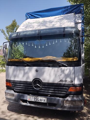 тактический жилет: Грузоперевозки на тентованном бортовом грузовике Mercedes-Benz Atego — 1