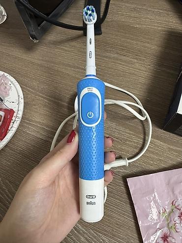 diş fırçası: Oral-B Braun elektrik diş fırçası (mavi-ağ rəng). Ustunde hediye dis — 2