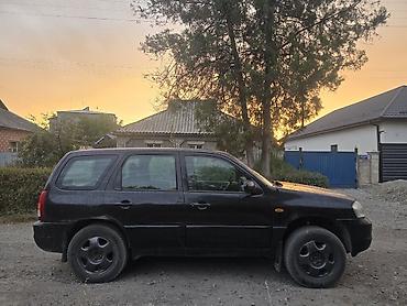 golf iii: Mazda Tribute: 2000 г., 2 л, Механика, Газ, Кроссовер — 6