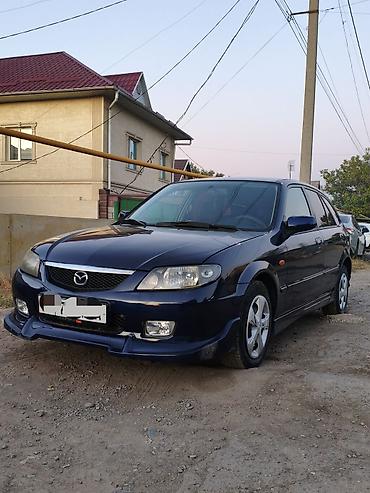 bmb e36: Mazda 323: 2002 г., 1.6 л, Механика, Бензин, Хэтчбэк — 4