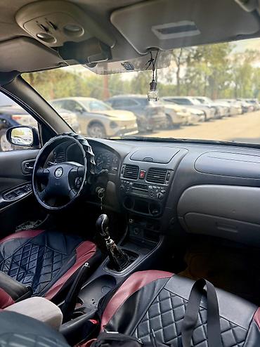 текен: Nissan Altima: 2000 г., 2.2 л, Механика, Дизель, Хэтчбэк — 6
