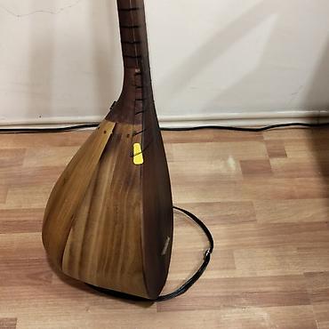 6 струнная укулеле: Saz – uzun qol, çoxbucaqlı armud formalı gövdə ilə xalq çalğı aləti — 3