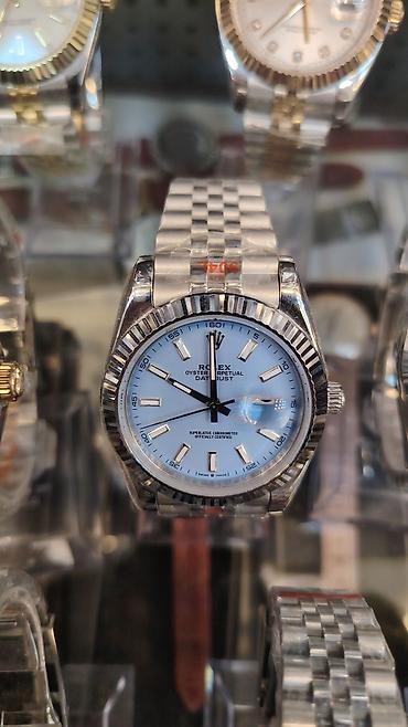 lv saat: Rolex saat kolleksiyası – Oyster Perpetual Datejust və Day‑Date — 2