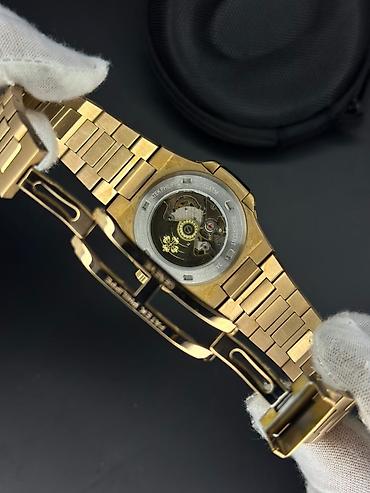 das sekilleri: Yeni, Qol saatı, Patek Phillipe, rəng - Qızılı — 7