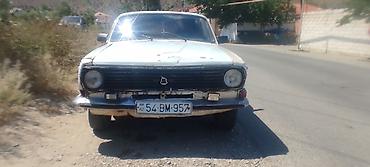 24 volqa: Model: GAZ Volga (GAZ-24 seriyası) Kuzov: sedan, ağ rəng Nömrə nişanı — 1
