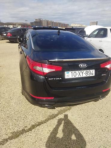 avtomobil qızdırıcı: Kia Optima SXL – biznes sinfi sedan - Korpusu: qara rəng, SXL paketi — 9