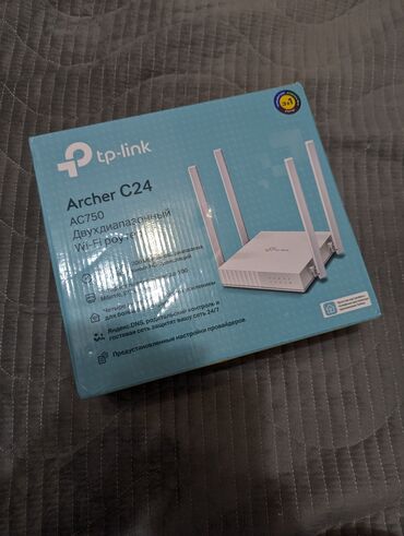 Модемы и сетевое оборудование: Продаю почти новый вай-фай роутер TP-LINK Archer C24 Валяется без