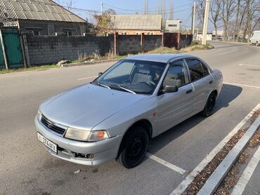 Mitsubishi: Mitsubishi Lancer: 1998 г., 1.3 л, Автомат, Бензин, Седан