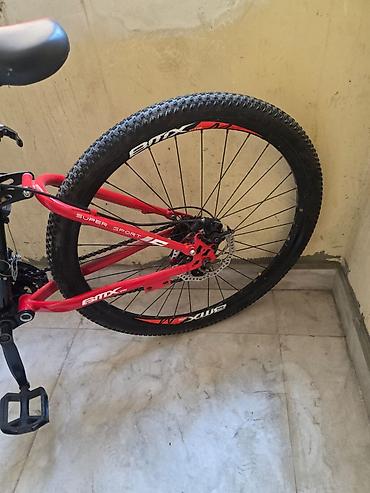 yesebet: BMX GTM tipli dağ velosipedi. Qara-qırmızı rəng kombinasiyasında — 9