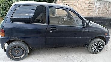 нур мото: Daihatsu Cuore: 1999 г., Механика, Хэтчбэк — 4