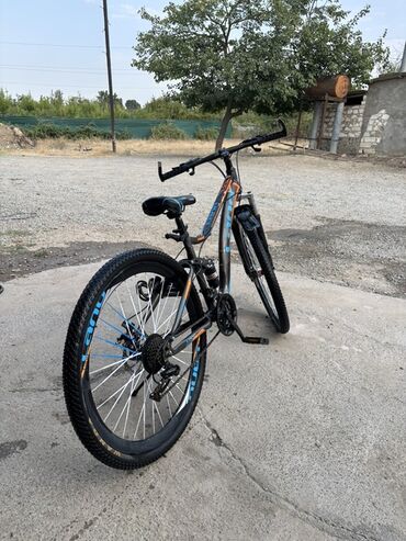 İdman velosipedləri: Ön asqılı, disk əyləcləri və möhkəm çərçivəsi olan dağ velosipedi — 16