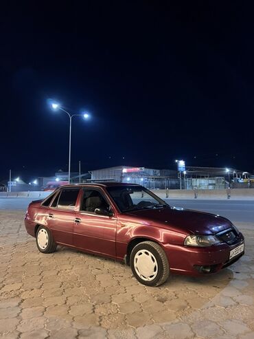 привозной мотор нексия: Седан Daewoo Nexia глубокого бордового цвета, оборудованный белыми