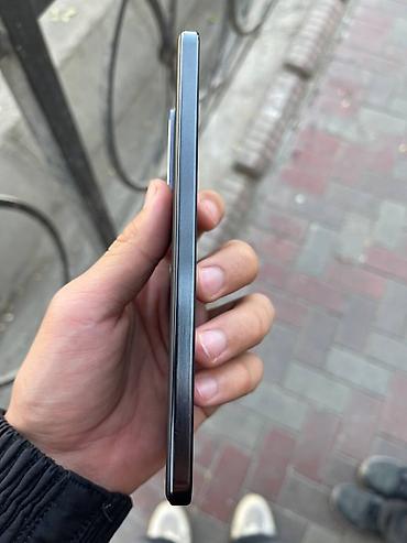 Другие мобильные телефоны: Смартфон с плоскими боковыми гранями и металлической рамкой. Цвет — — 7