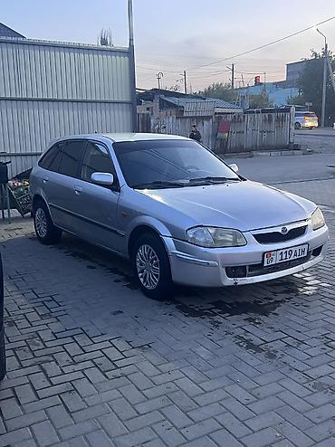saab 93: Mazda 323: 2000 г., 1.6 л, Механика, Бензин — 9