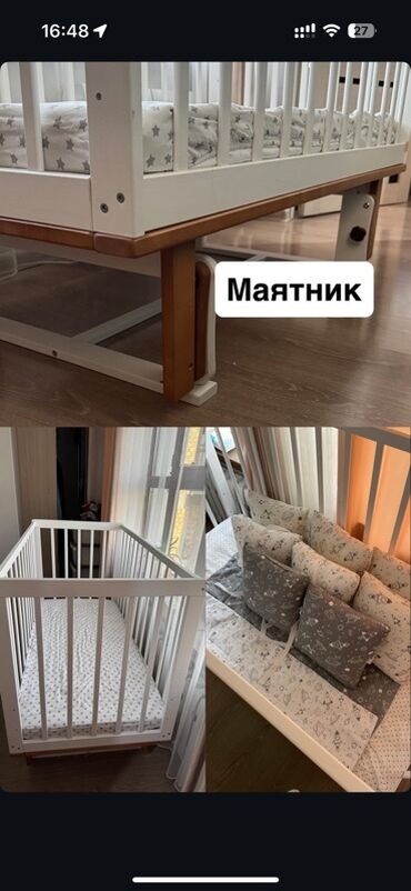 детская кровать с качалкой: Белая детская кроватка с деревянными элементами, оснащенная механизмом