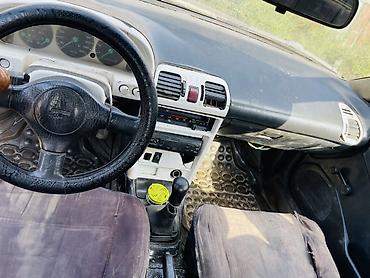 Продажа авто: Mazda 323: 1989 г., 1.6 л, Механика, Бензин, Хэтчбэк — 4